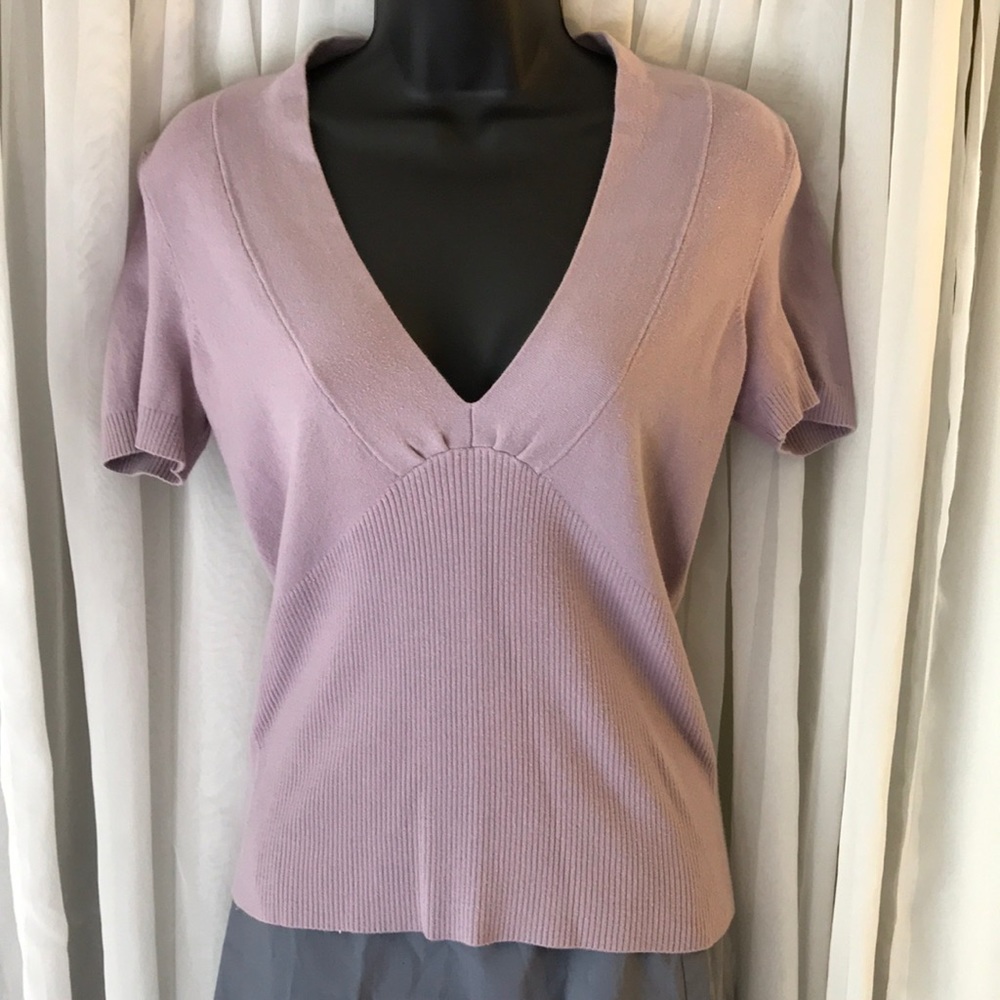 Lavender sweater.